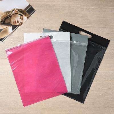 China Disposable Custom Plastic Non Woven Transparent Clothing Zip Lock Bag Garment Zipper Bag With Handle for sale