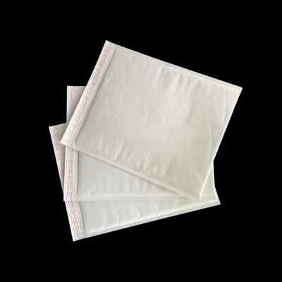 China Customized Moisture Proof Design White Self Adhesive Envelopes Mailing Kraft Paper Bags Bubble Mailer for sale