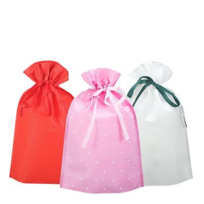 China Custom Universal Non Woven Drawstring Bag Logo Moisture Proof Packing Gift Wrapping Bag for sale