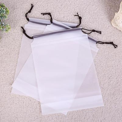 China Plastic Moisture Proof Storage Bag Clothes Socks Towels Underwear Travel Storage White Waterproof Frosted Drawstring Bag for sale