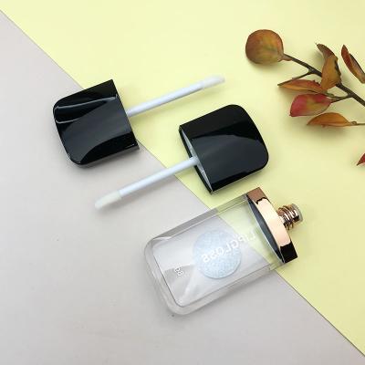 China Unique Lip Gloss Tube Wand Tube Black Lip Gloss Packaging Box Cosmetic Flat Lip Gloss Containers for sale