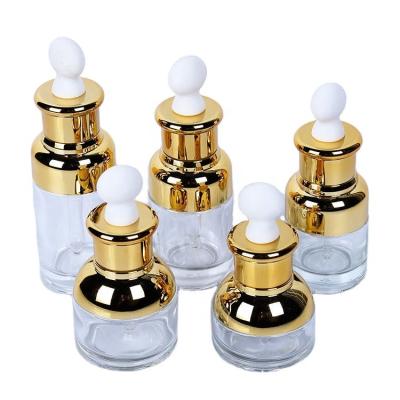 China 20ml 30ml 50ml personal care oil bottles glass bottle suite packing high grade pure essencedropper flat rubber head bottle for sale