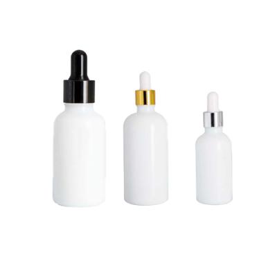 China CANDY 10ml 30ml 1oz 50ml 100ml Olive Oil Opal Glass White Ceramic Essential Cosmetic Bottle for sale