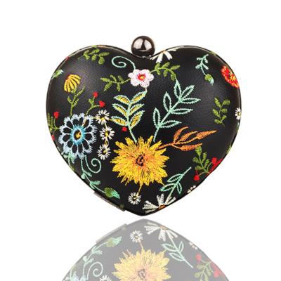 China Clutch Design Heart Shape Bag With Colorful Embroidered Flowers Ladies Clutches Wholesale for sale