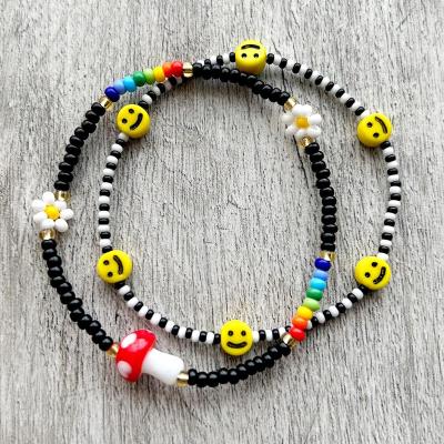 China Go2boho BOHEMIA Black White Pearl String Elastic Bracelets For Women Kids Girl Gift Smiley Charm Tiny Jewelry for sale