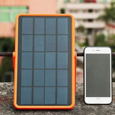 China 30000mAh Outdoor Portable Outdoor Travel LED Light Solar Panel Large Capacity Solar Power Bank Fast Charging Charger for sale