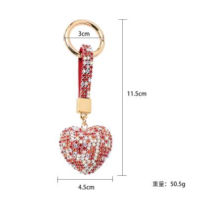 China Valentine's Day Gift Metal Crystal Diamond Heart Shape Purse Bag Charm Pendants Glitter Colorful Heart Keychains for sale