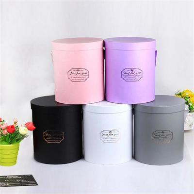 China Custom Recyclable Logo Cylinder Round Wedding Flower Gift Boxes Waterproof Recyclable Cardboard Paper Tube Packaging for sale