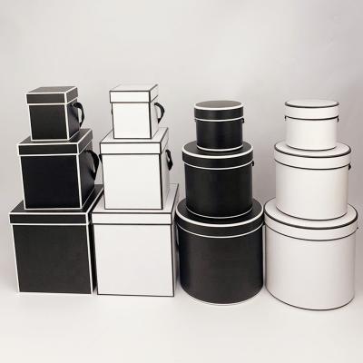 China Exquisite Wholesale Recyclable Paper Boxes Paper Tubes For Black Lined Flowers, Paper Tubes Gift Packaging Round Hat Boxes for sale