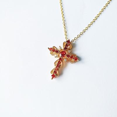 China Luxury European and American Zircon women's blood dove necklace classic cut cross pendant retro ruby ​​low gold clavicle chain for sale