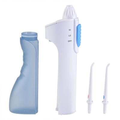 China Outdoor Portable Battery Operated Pulsating Electric Irrigator Oral Ultrasonic Tooth Cleaner Teeth Cleaner for sale