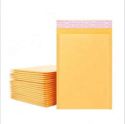 China Stock Design Eco-friendly Custom Kraft Yellow Plastic Bubble Envelope Mailing Bags With Pictures for sale