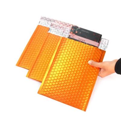 China Custom Print 8.5x12 Orange Metallic Bubble Mailer Private Label Bubble Mailers Thick Bubble Mailer for sale