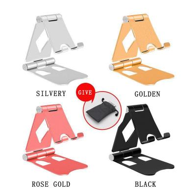 China Adjustable Universal Rotary Mobile Phone Desk Holder For Storing Portable Foldable Mobile Phone Anti Slip Bottom Seat for sale