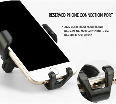 China Adjustable Plug In Cell Phone Holder Car Duct Leather Gravity Mobile Holder For Cell Phone Charger for sale