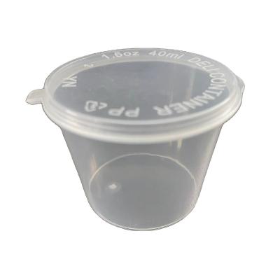 China Food Grade Eco Friendly Stocked Take-Out Injection Mold 1.5 Ounce Disposable Plastic Round Sauce/Salad Packing Container With Hinged Lid for sale