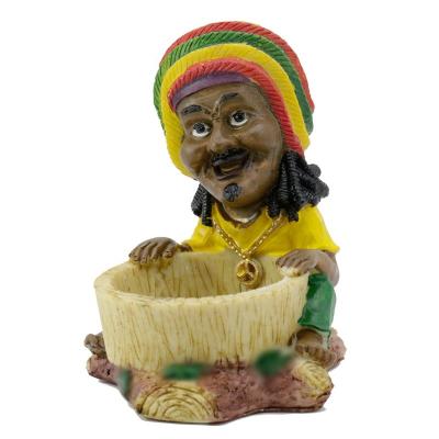 China Resin Courage Resin Wholesale Craft Old Style Jamaica Style Colorful Resin Ashtray For Table Decoration for sale