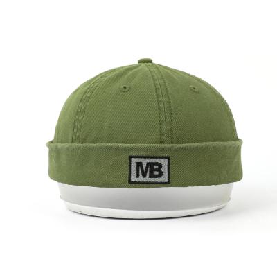 China Wholesale High Quality COMMON Vintage Green 6 Panel Adult Canvas Rolled Cuff Visorless Hat Embroidery Brimless Hat Factory Supply for sale