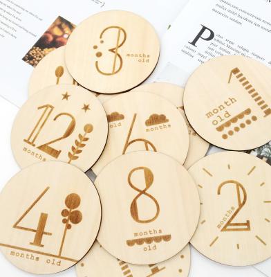 China China Hot Sale Eco-friendly Wooden Monthly Draft Card and Baby Shower Gift Baby Circle Handmade Wood Carved China 300pcs for sale