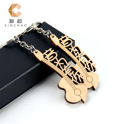 China Wooden Gift Key Chain Factory Directly Supply Wooden Christmas Creative Gift Price The 1 Opp Bag Custom Logo Custom Stainless Steel Stand for sale