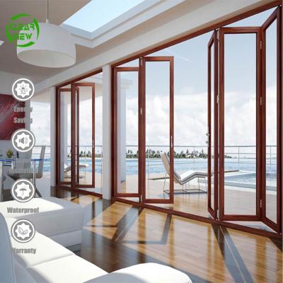 China Clearview NFRC Modern Aluminum Clad Wood Bifolding Finish Interior Double Glazed Folding Doors for sale