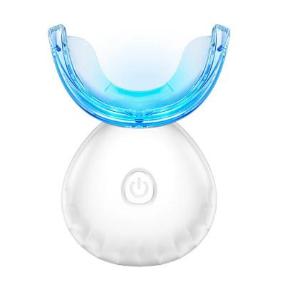 China Raincoat ; Blue Light Dental Whitening Kit Led Tooth Whitening Device Rechargeable Home Electric Radio Teeth Whitening for sale