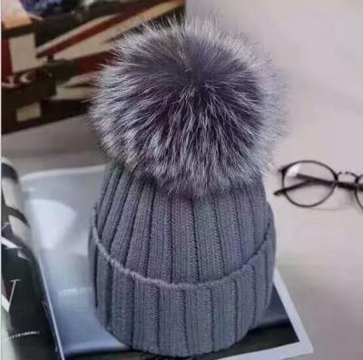 China COMMON Winter Hats For Women Natural Warm Wool Pompom Fur Slouchy Beanies Hat For Female Lady Fashion Skullies Hats for sale