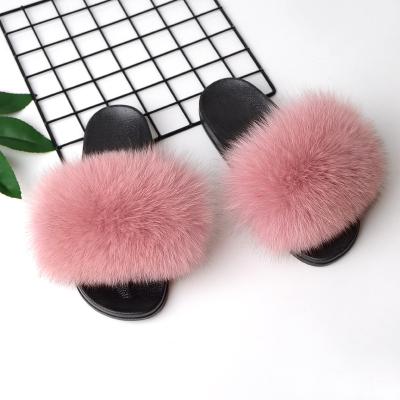 China Fashion Trend Logo Eva Raccoon Fur Slippers Indoor Unique Hairy Slides Sandal Colorful 100% Fluffy Slipper For Women for sale