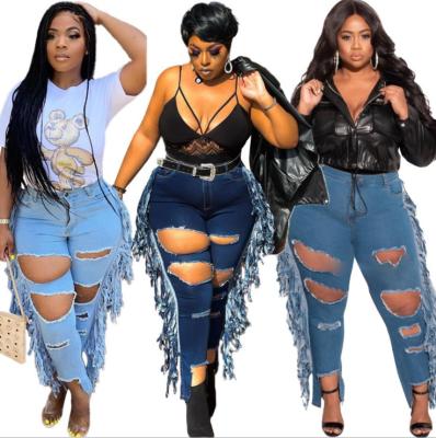 China 5XL viable plus size women's jeans street fashion jeans ladies tassel skinny tight ripped jeans for sale