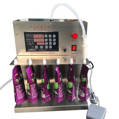 China Standard Semi-automatic Pocket Spout Bag Filling Machine Milk Tea Water Chemical Desktop Filler for sale