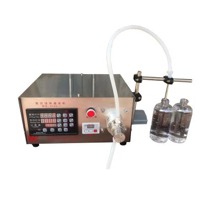 China Semi-automatic Desktop Commodity Essential Oil Filling Machine Mini Mouthwash Filling Machine for sale