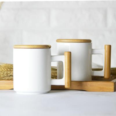 China Sustainable Life Creative Cultural Ceramic Mug Tube Cup Tube Mug Office Straight Mug With Bamboo Handle for sale