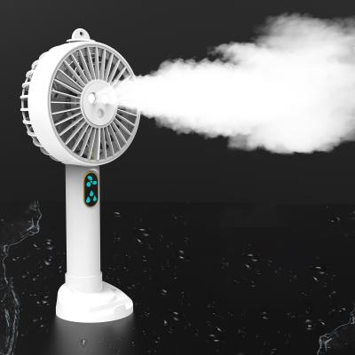 China New Design Fan 2021 Water Spray Mist Fan Factory Patent Portable Water Spray Mist Fan Electric Rechargeable Hand Mini Fan for sale