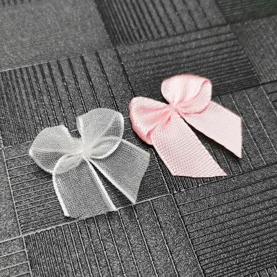 China Underwear flower shape satin ribbon bow flower for clothes handmade ribbon bow customized garment accessories for sale