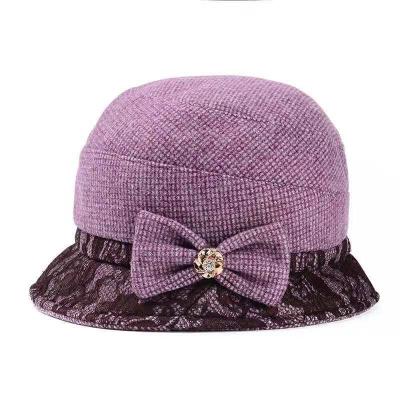 China High quality ny character bucket hats with bowknot white bucket hat winter for women winter stylish newsboy hat for sale