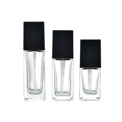 China Personal Care 20ml 30ml 40ml Clear Square Glass Bottle With Black Pump For Essential Lotion Oli Moisturizer Facial Water Liquid Cream for sale