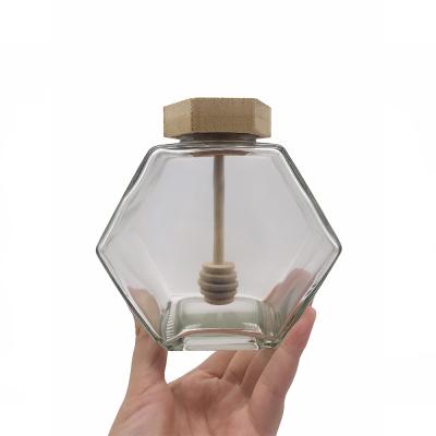 China Special Shape Bottle Honey Viable Glass Jar Hexagon Sealed Cans Logo Flat Glass Jar for sale