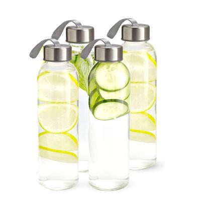 China Best Sustainable For Beverage And Squeezer Drinking 550ml Clear Transparent Glass Water Bottles With Lid for sale