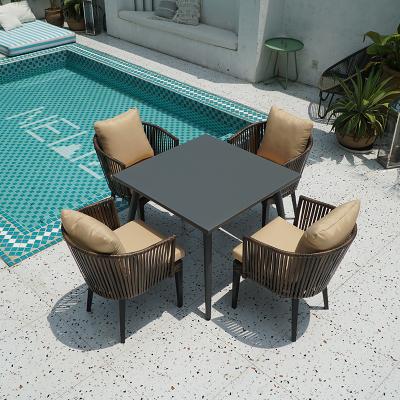 China Contemporary Competitive Price Outdoor Garden Furniture Rattan Dining Table Chairs Rattan Wicker Table With 4 Chairs for sale