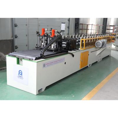 China Automatic Operate Shutter Strip Making Machine Door Slat Roll Forming Machine Iron Door Slat Making Machine for sale