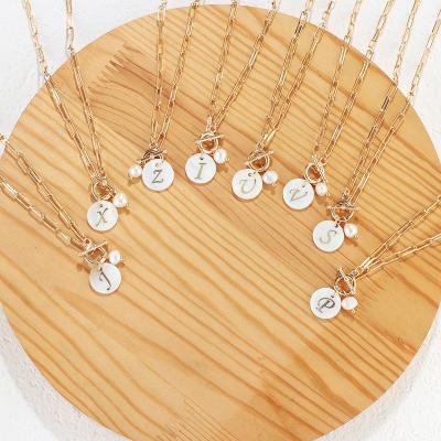 China The Other 26 Letter Border Hot Pearl Necklace New Personality Pendant Necklace for sale