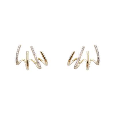 China Fashion Ladies Punk Jewelry 925 Silver Needle Gold Zirconia Four-claw Earrings With Row for sale