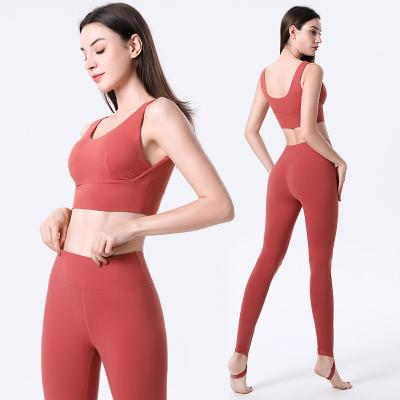 China Breathable High Waist Elastic Exercise Stirrup Leggings Sets Yoga Fitness Sexy U-Shape Sports Bra Covered Panties Sets Workout Two Piece Set for sale