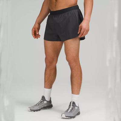 China LULU Sports Wear Four Ways Custom Anti-Wrinkle Mens Split GYM Shorts Bodybuilding Black Reflective Running Jogger Shorts 3