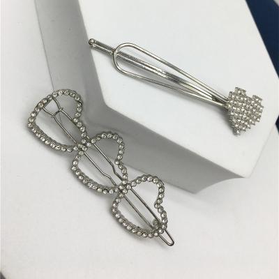 China 50% zinc alloy 10% glass 40% iron Easy maintenance loving heart RHODIUM PLATING rhinestone Heart hairpin set for sale