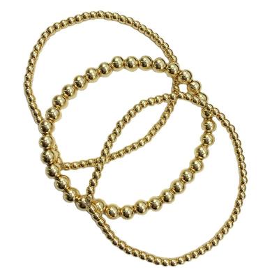 China TRENDY 18K GOLD PLATED Triple beaded elestics gold bead bracelet set for sale