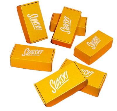 China Customization Recyclable Gold Foil Aircraft Box Package Orange Corrugated Paper Box For Gift Giving for sale