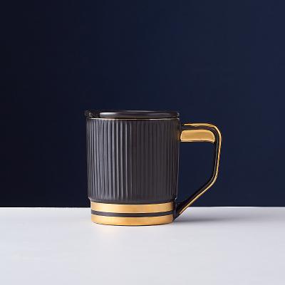 China Viable Handle Nordic Ceramic Porcelain Gold Color Tea Cups Black Vertical Stripes Coffee Mug For Couples for sale