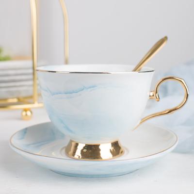 China Luxury Hot Selling Viable Bone China Gift Set Gold Ceramic Cup And Saucer Handle Marbling Cup And Saucer for sale