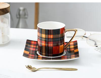 China Sustainable Ceramic Porcelain Cups And Saucers Small Coffee Cup And Saucer Set Office Red Plaid Cups And Saucers for sale